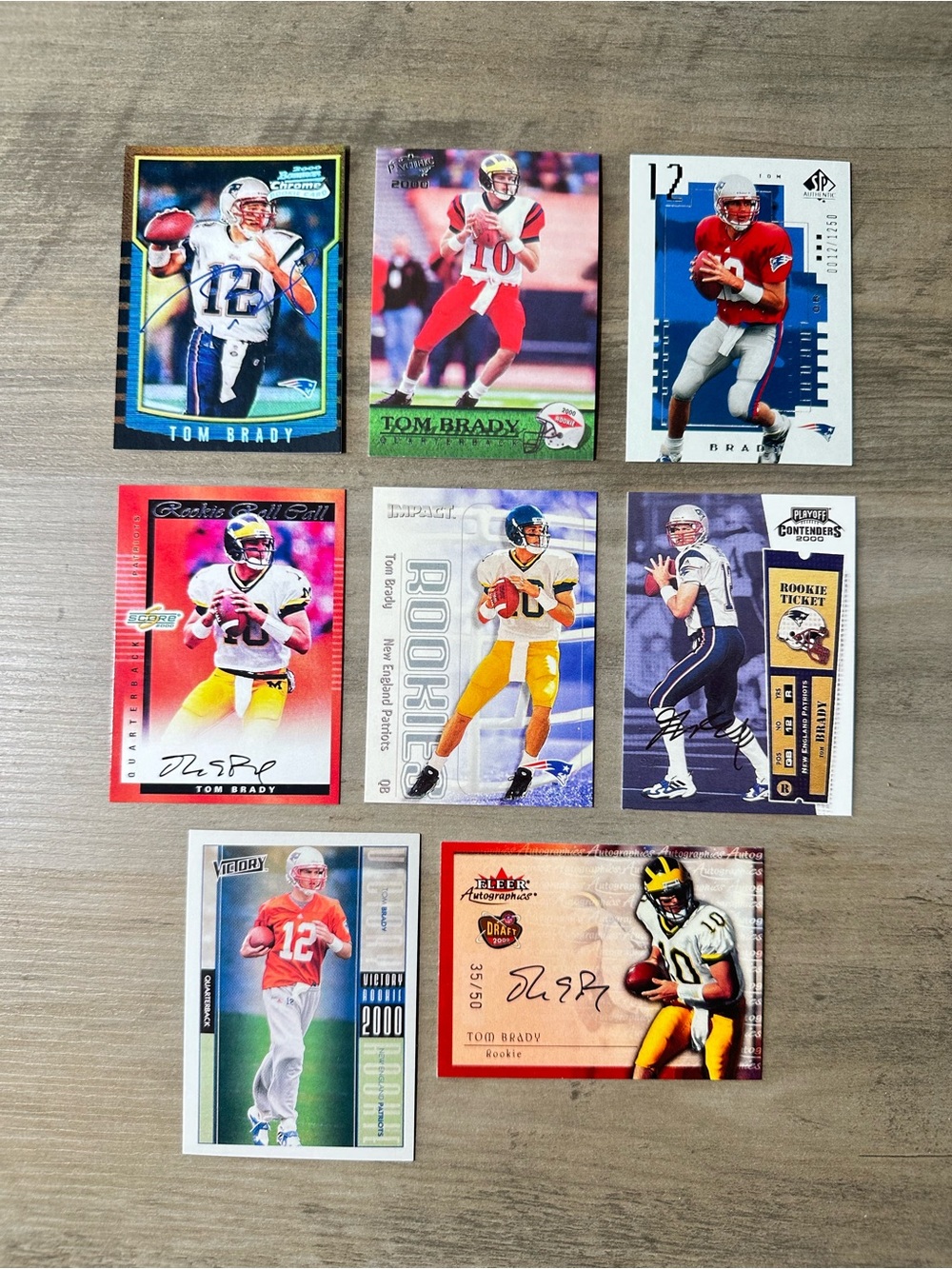 Tom Brady Rookie Signed Lot of (8) Bowman Upper Deck Novelty Cards.